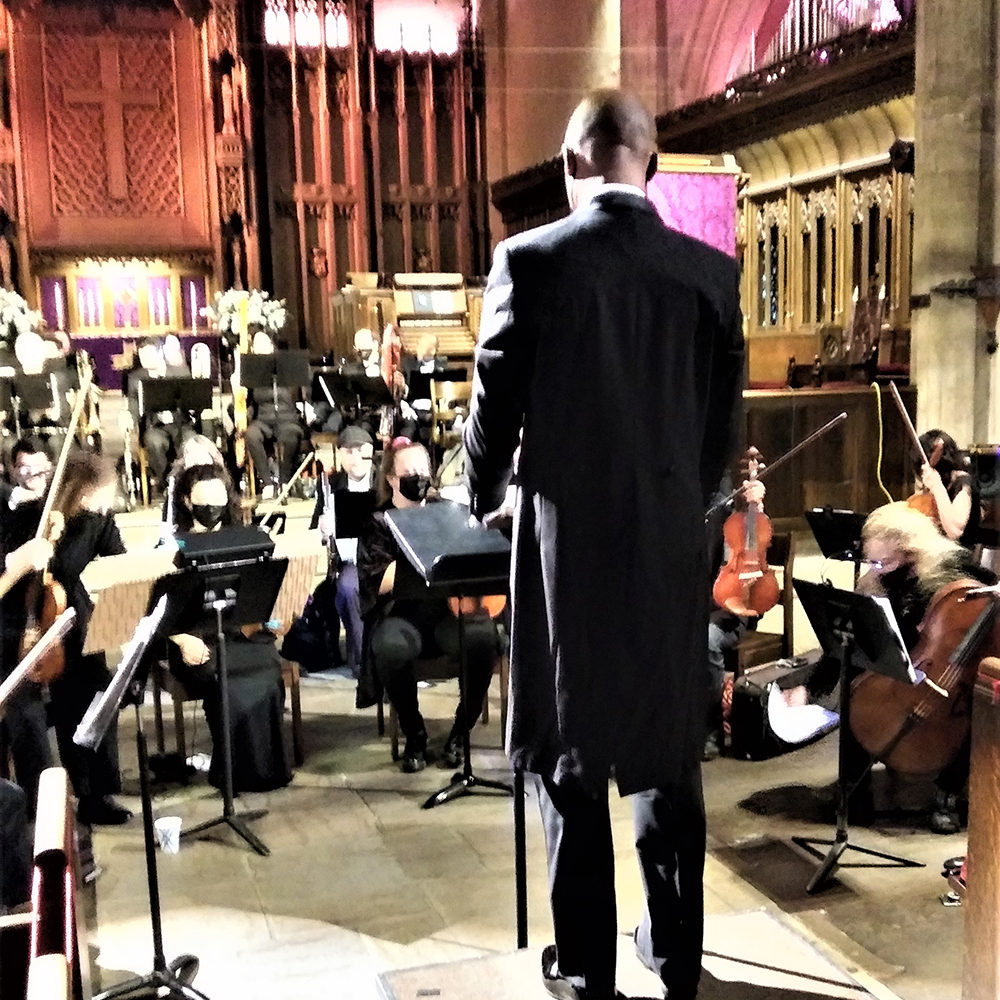 Womack conducting