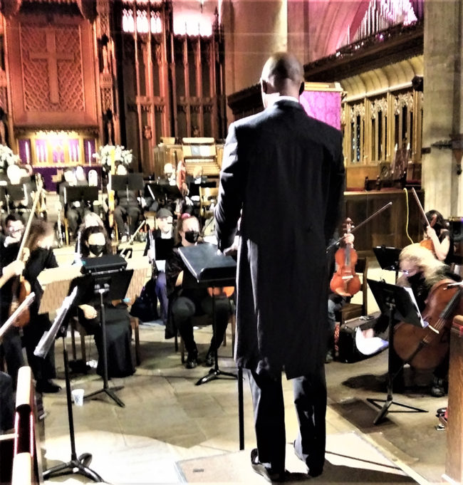 Womack conducting